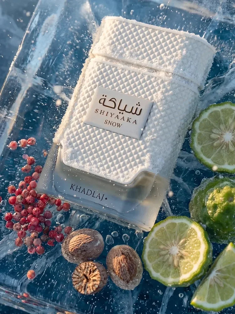 Khadlaj Shiyaaka Snow perfume bottle on ice with bergamot and nutmeg